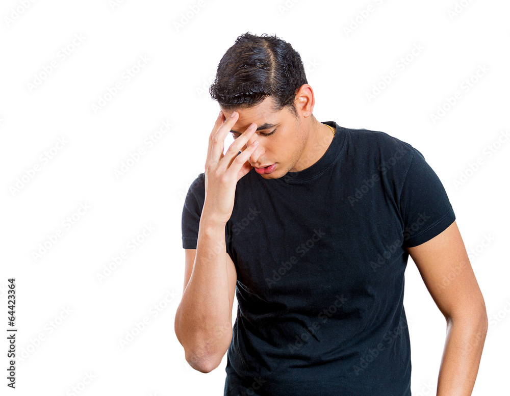 Young man having headache, stressed, tired, fatigued Young man having headache, stressed, tired, fatigued