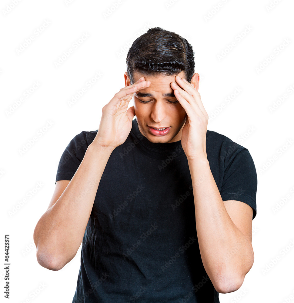 Young man having headache, stressed, tired, fatigued Young man having headache, stressed, tired, fatigued