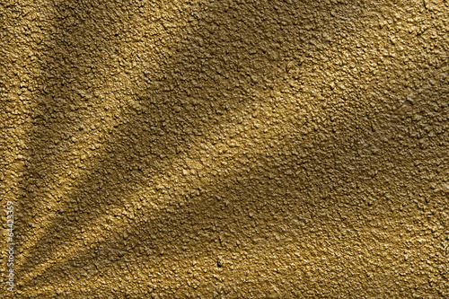 texture of plaster in gold