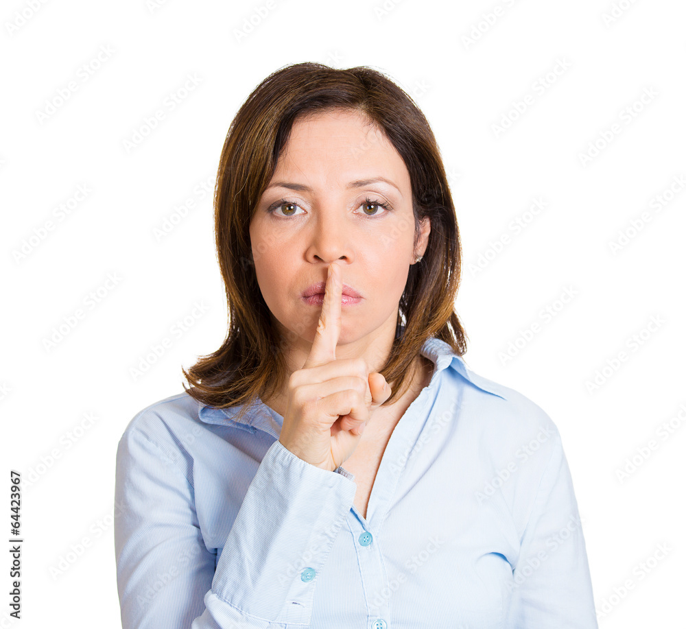 Silence please, shut up quiet. Woman with finger on lips gesture Silence please, shut up quiet. Woman with finger on lips gesture