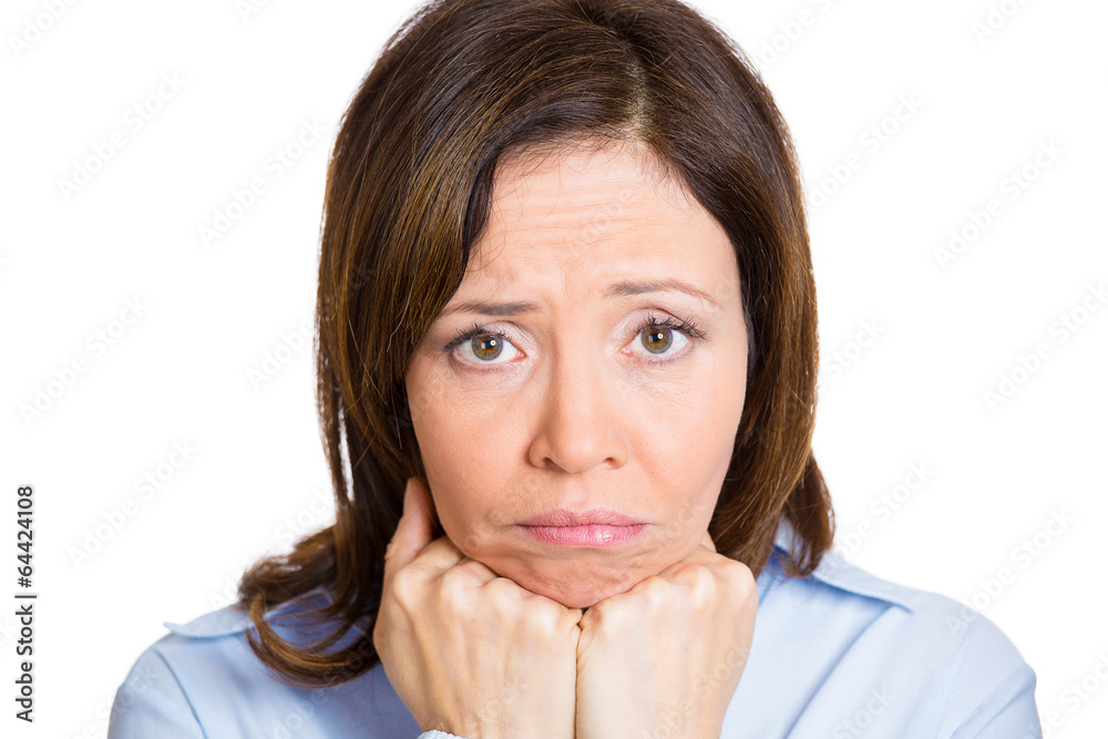Portrait, headshot sad, upset, depressed middle aged woman Portrait, headshot sad, upset, depressed middle aged woman