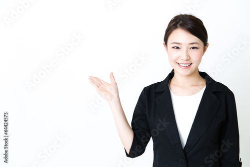 asian businesswoman showing on white background © taka