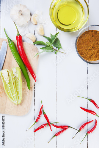 curry ingredients on white wooden board photo