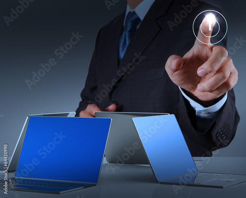 businessman hand pointing to padlock on touch screen computer as