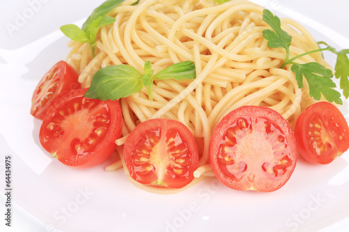 Italian pasta with tomatoes and basil.