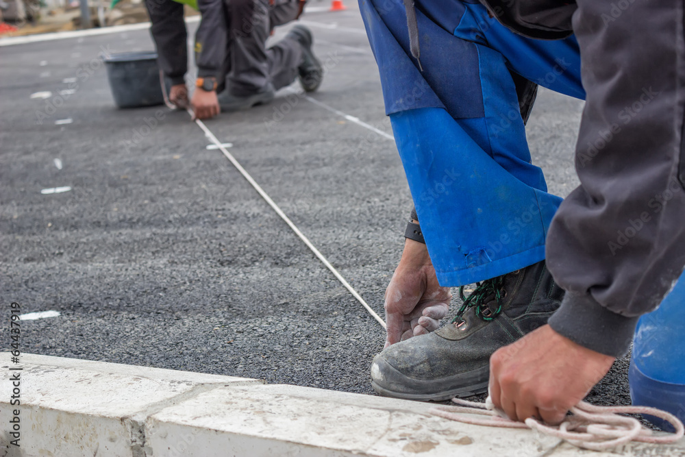 Road workers chalking Road workers chalking