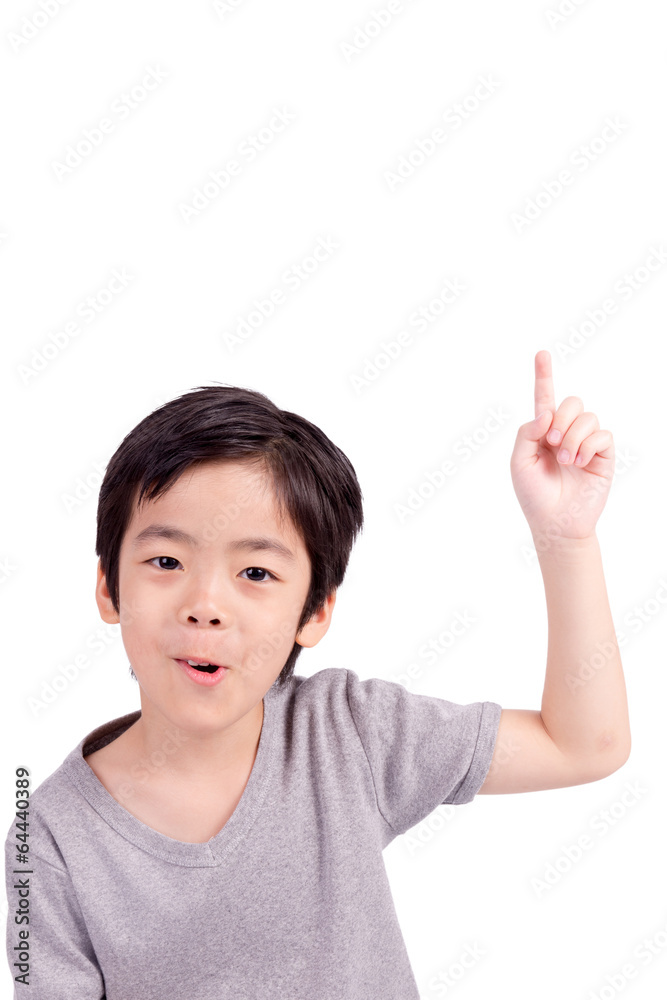 Happy boy pointing up isolated on white background Happy boy pointing up isolated on white background