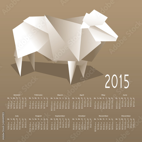 Calendar 2015 with a paper sheep on a brown background