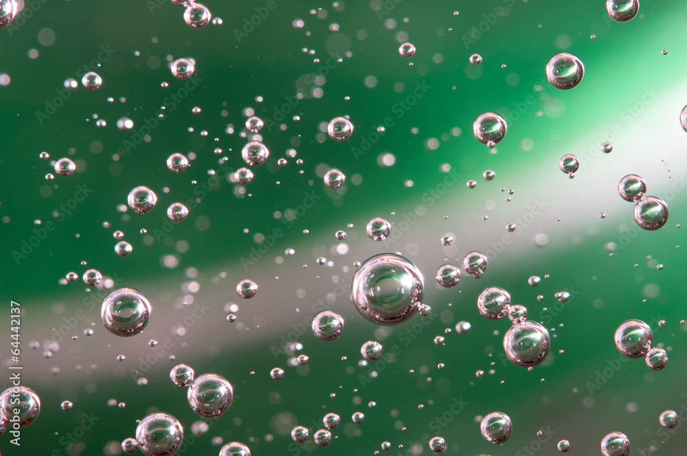 Air bubbles . Background green. Macro