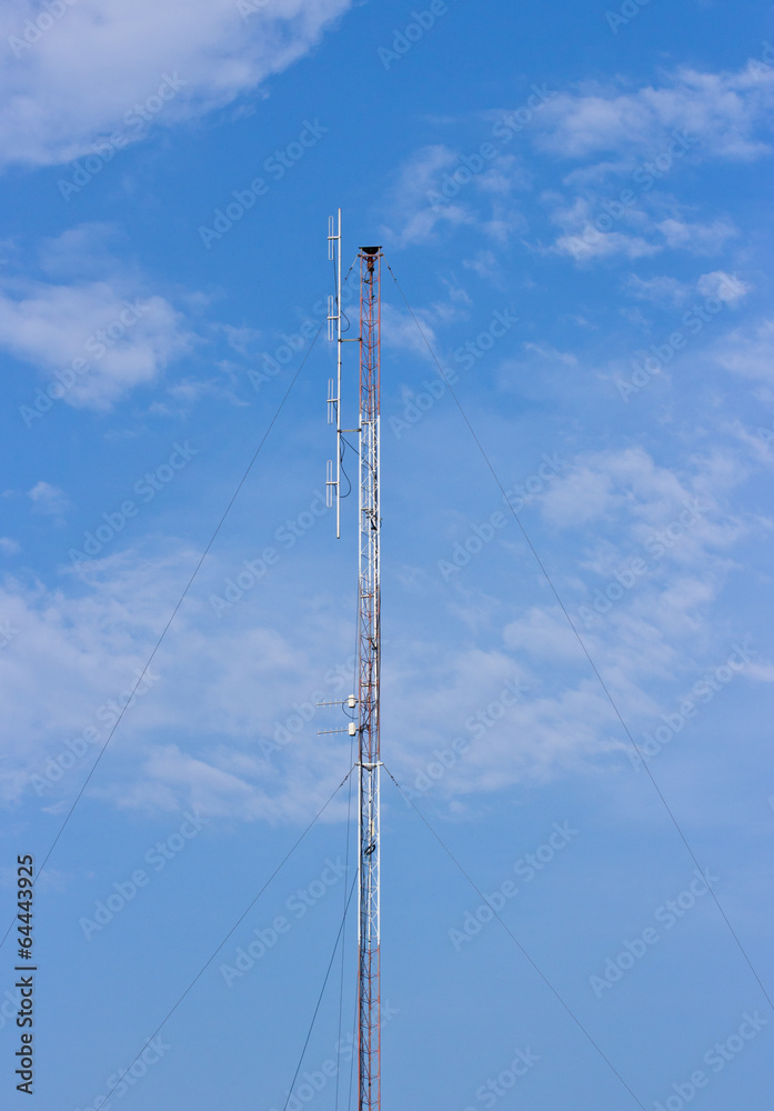 Telecommunication signal tower on blue sky Telecommunication signal tower on blue sky