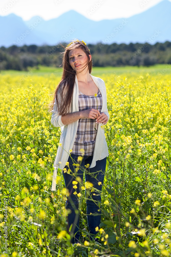 Fototapeta premium Beautiful natural young woman in the country.