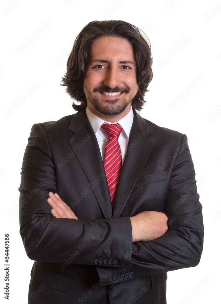 Standing turkish businessman with beard and crossed arms Standing turkish businessman with beard and crossed arms