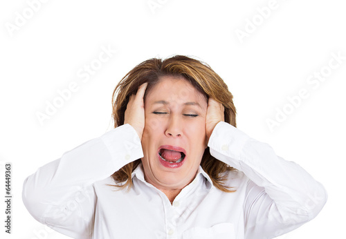 headshot woman having headache screaming on white background 