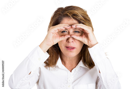 Peeking, curious looking female, white background 