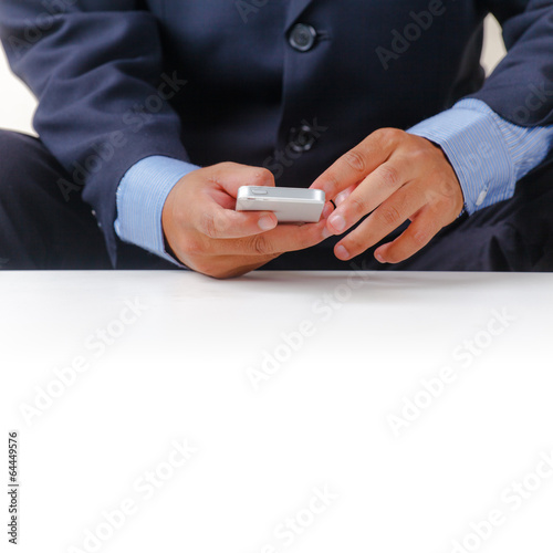 Businessman using smartphone © Naypong Studio