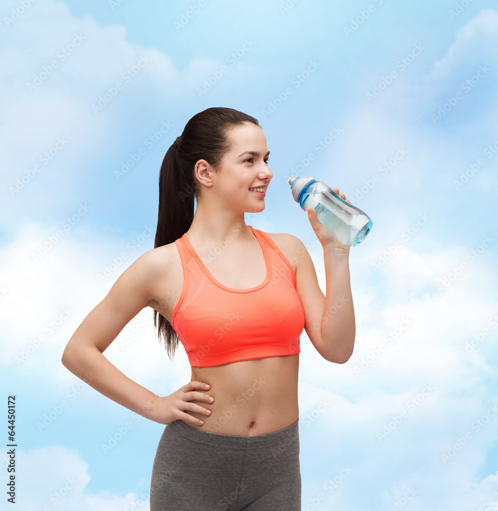 sporty woman with water bottle sporty woman with water bottle