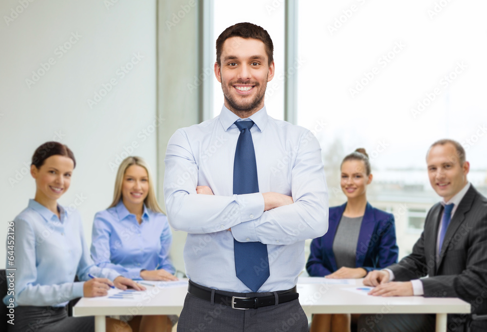 handsome businessman with crossed arms handsome businessman with crossed arms