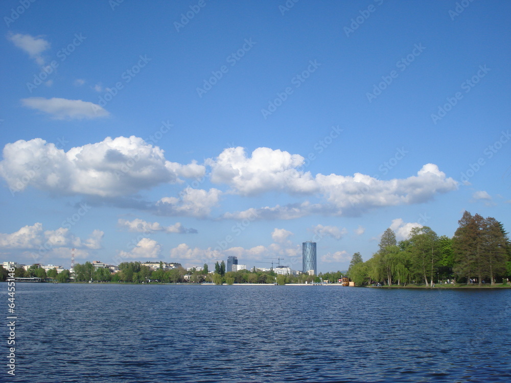 View of office buildings over Herastrau lake in Bucharest