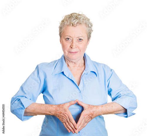 Foto Senior woman with hand leader gesture on white background