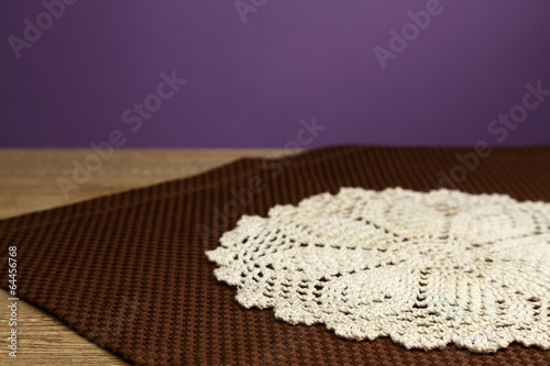 Background with wooden table and tablecloth