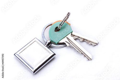 A bunch of keys with a key ring, isolated on a white background