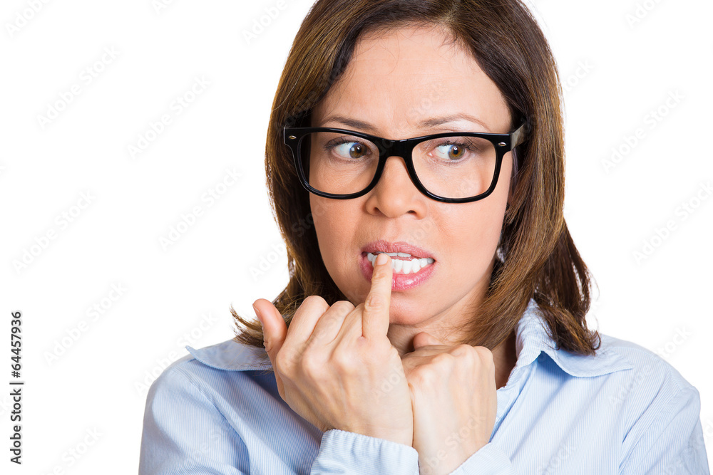 Portrait Anxious woman biting nails isolated white background Portrait Anxious woman biting nails isolated white background