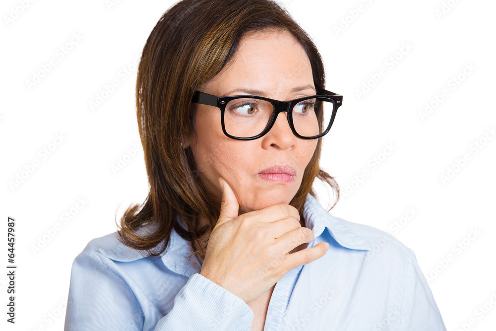 headshot middle aged woman making serious decisions