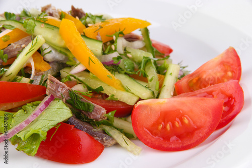 Beef salad on plate close up