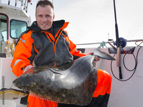 Slika na platnu Man with huge halibut fishing trophy