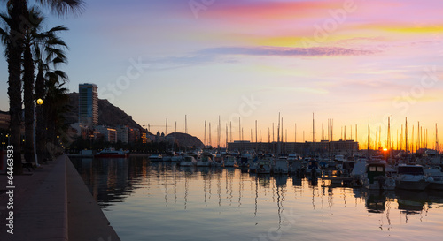  Port with yachts and embankment in sunrise. Alicante
