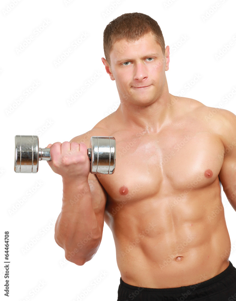 Handsome muscular man working out with dumbbells Handsome muscular man working out with dumbbells