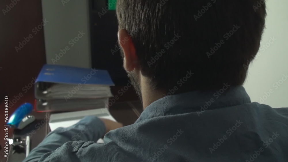 Business Man Putting Papers In An Envelope