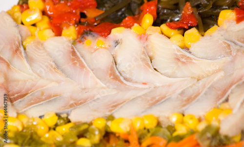 Fototapeta Naklejka Na Ścianę i Meble -  pieces of fish with vegetables and seaweed