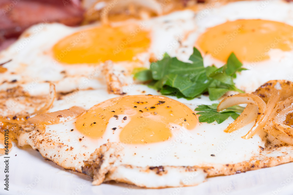 Breakfast with fried eggs beacon and onion Breakfast with fried eggs beacon and onion
