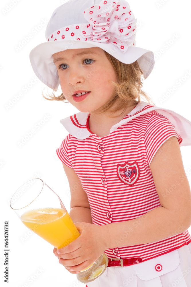 charming little girl with a glass of juice. charming little girl with a glass of juice.