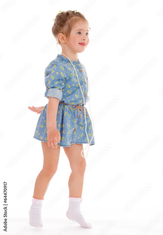 charming little girl playing and having fun. charming little girl playing and having fun.