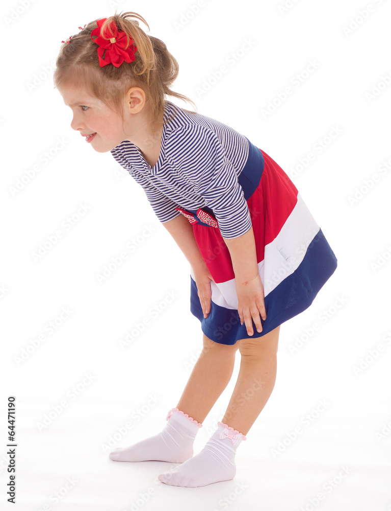 charming little girl posing in studio. charming little girl posing in studio.