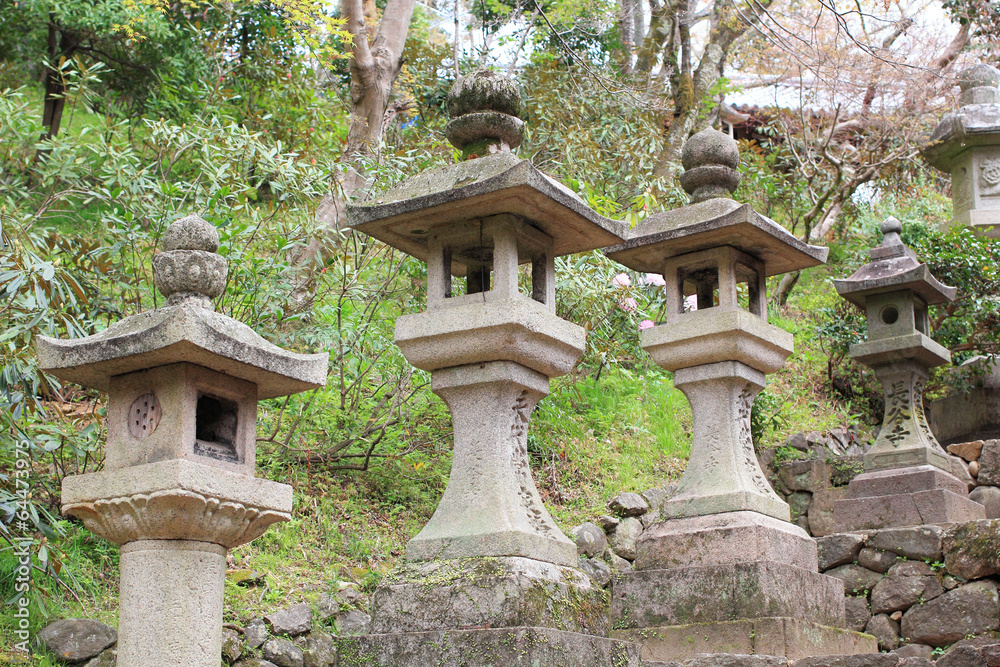 Stone tower japanese lanterns in Hasedera temple Nara Japan Stone tower japanese lanterns in Hasedera temple Nara Japan