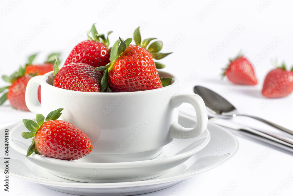 Festive table set with strawberry on white background side view Festive table set with strawberry on white background side view