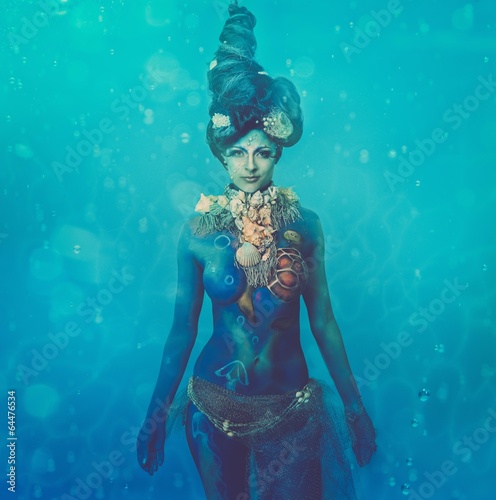 Fantasy underwater woman creature with body art