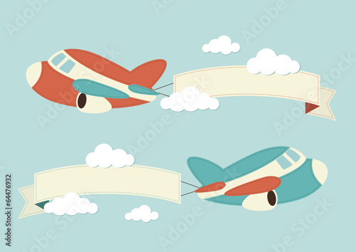 Planes in the clouds with banners
