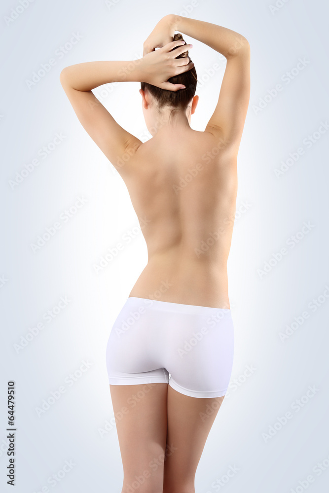 Body of woman ass and back on white background