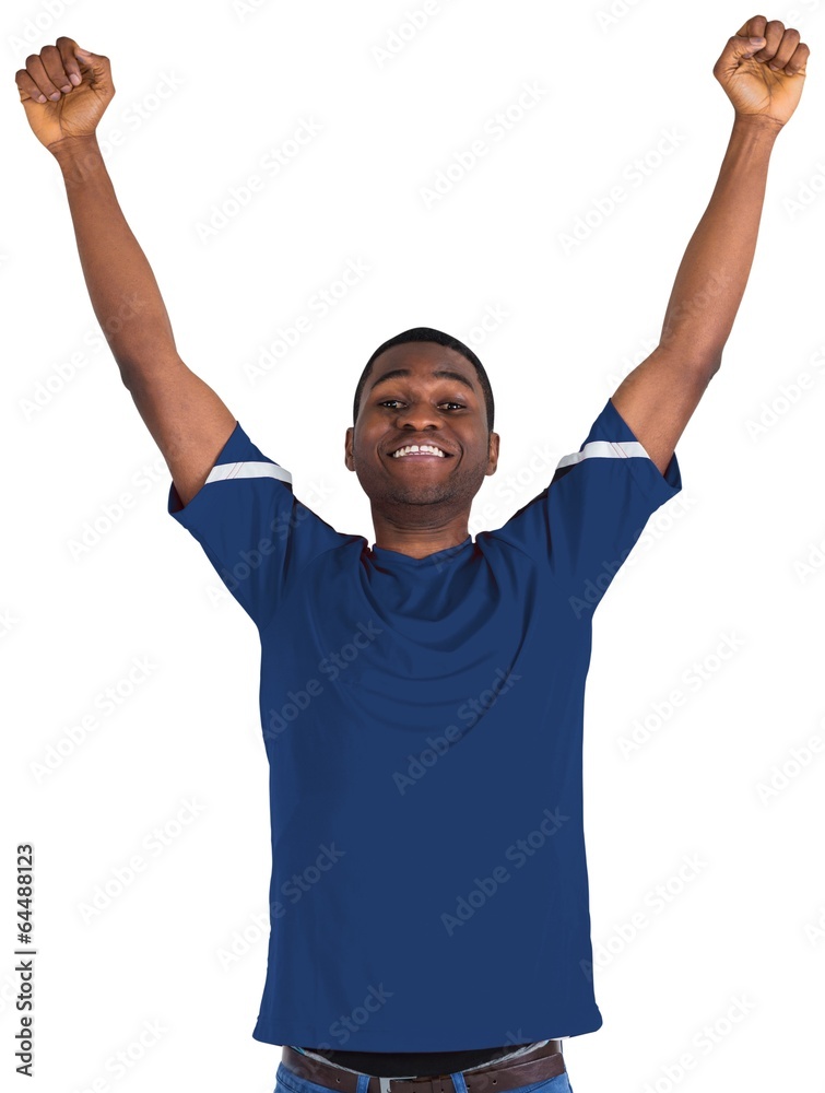 Cheering football fan in blue jersey
