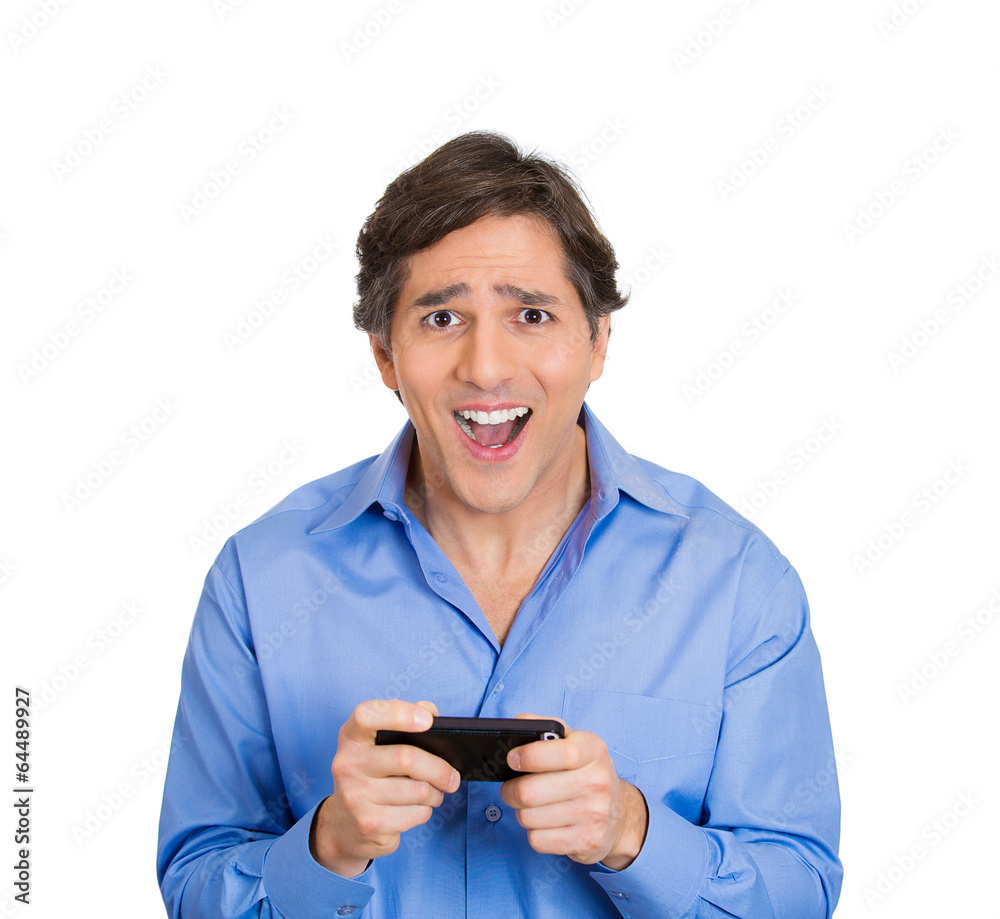 Happy man sees something exciting on phone, smiling Happy man sees something exciting on phone, smiling