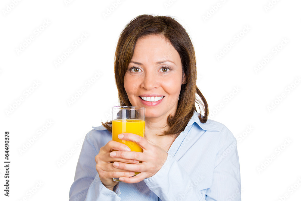 Happy, smiling woman holding glass of juice, white background Happy, smiling woman holding glass of juice, white background