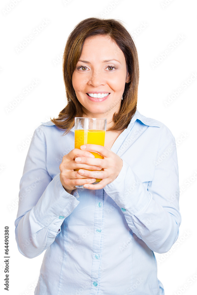 Happy, smiling woman holding glass of juice, white background Happy, smiling woman holding glass of juice, white background