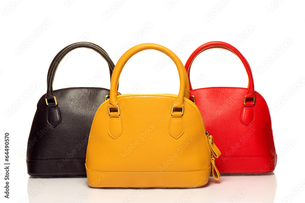 three purses on white background three purses on white background