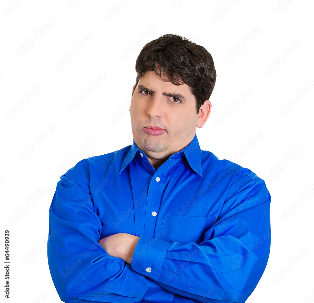 Suspicious, skeptical young man, unhappy with situation Suspicious, skeptical young man, unhappy with situation