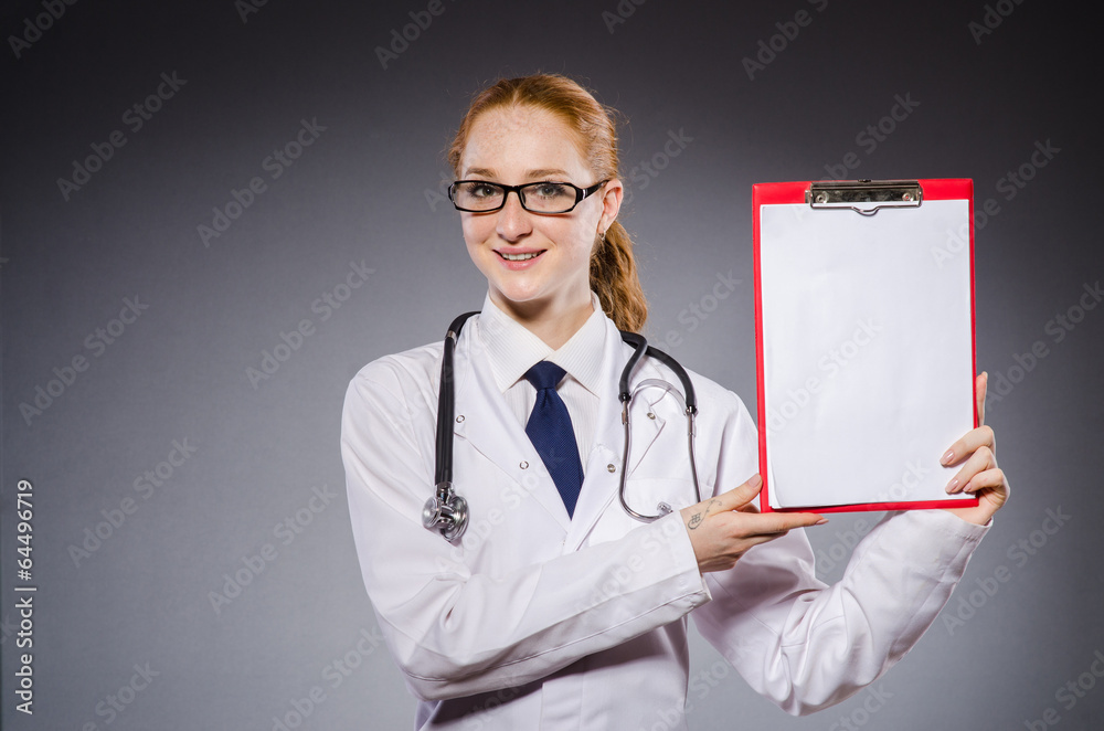 Woman doctor with paper notepad Woman doctor with paper notepad