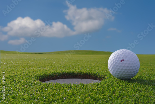 golf hole and ball